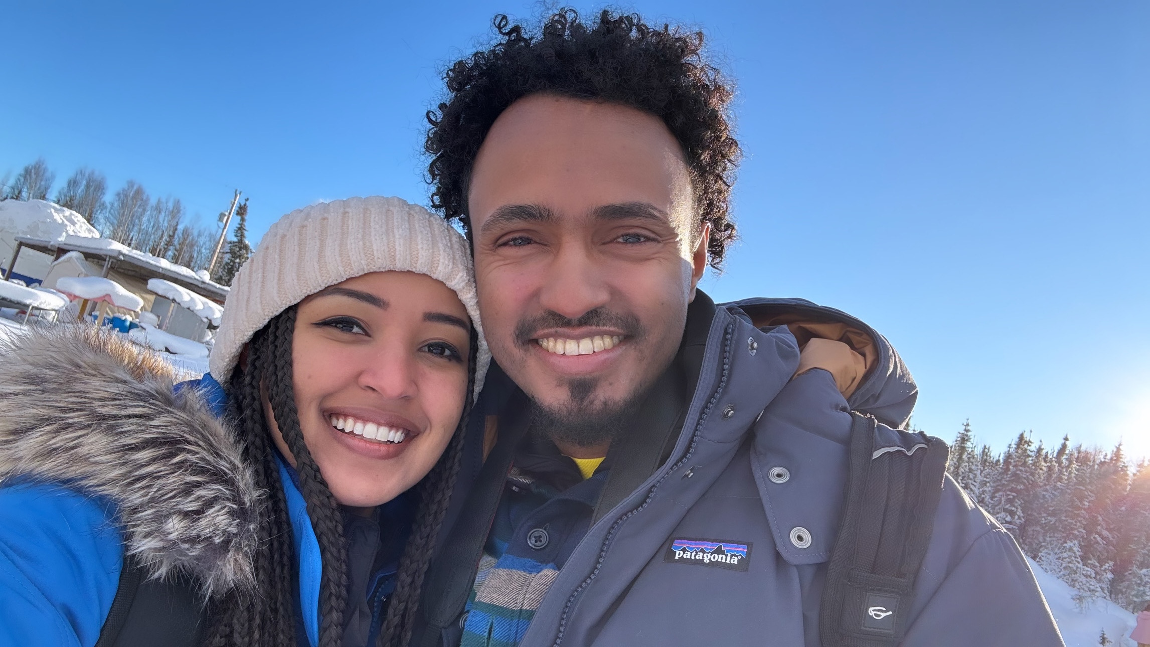 Henok and Elshu dog sledding in Alaska